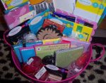 This is a hand made scrapbooking gift  basket