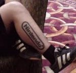 Tattoo on leg endorsing Nintendo