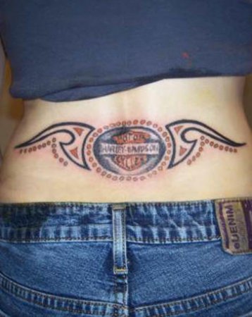 tramp stamp harley davidson tattoo on the back of a girl