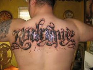 The Olde English Tattoo with the Name Rodriguez, a little more detail added