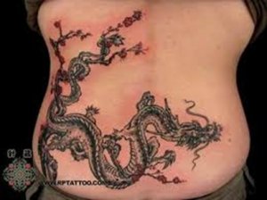 A cultural icon, the chines dragon, in tattoo form.