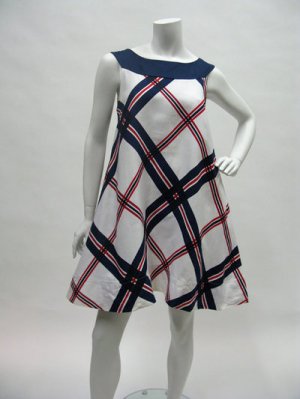 This is a 196-s stlye nautical baby doll dress. This is white with red and blue stripes on it.