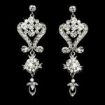 This is an image of sliver diamond earrings that are for a bride.