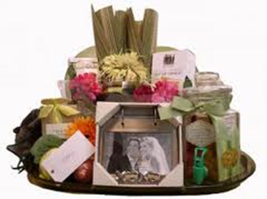 A Gift Basket for a wedding with photo album and other goodies