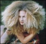 This is an image of a lady with very frizzy hair