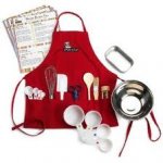 This is an image of children s cooking utensils, along with apron