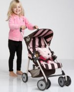This is an image of a little girl with a stroller and animal inside of it. This brand is juicy and is 85.00