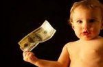 This is an image with a baby with money
