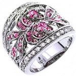 Imitation Ring that looks like it is for a Princess, Ornate with many fake diamonds and fake purple stones