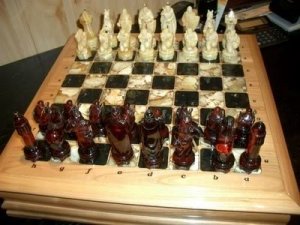 Chess Set Made Of Pure Amber And The Board Of High Quality Wood.